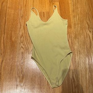 Pale yellow body suit